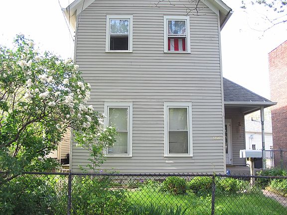 The house is the downstairs apartment in an up/down duplex. The units have separate entrances. The driveway has off-street parking for two vehicles. The upstairs unit parks on the street.