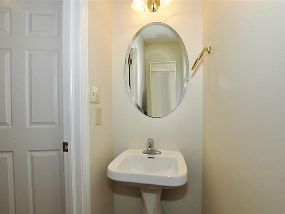 Downstairs 1/2 bath sink and commode