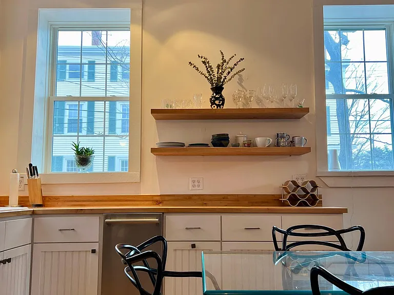 Alternate view of kitchen, with handmade red oak floating shelves.