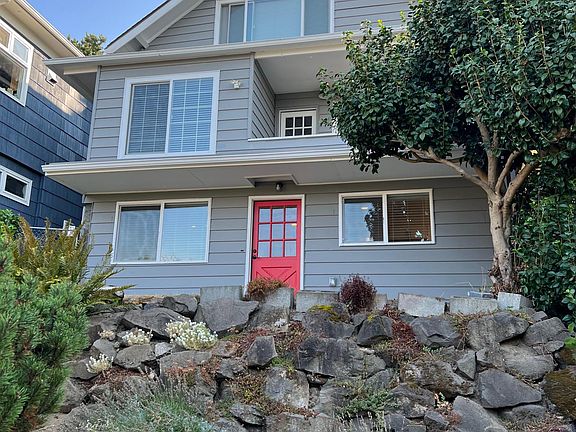 Back of house- Lower unit entrance at red door.