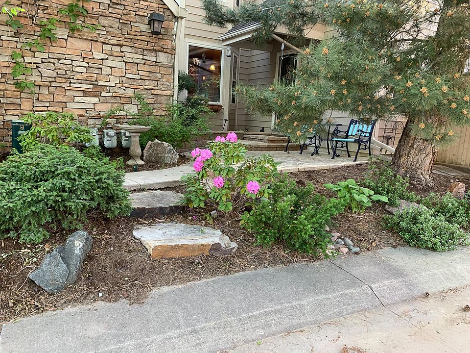 Professionally landscaped front entry