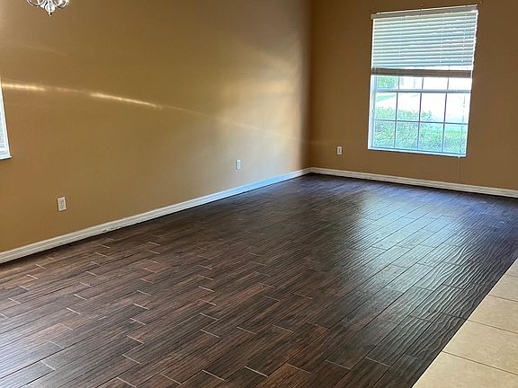 Enter to beautiful wood looking tile floor.
