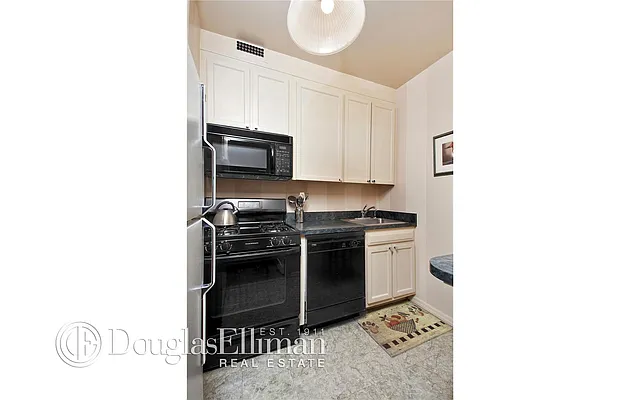 Sold by Douglas Elliman | media 18