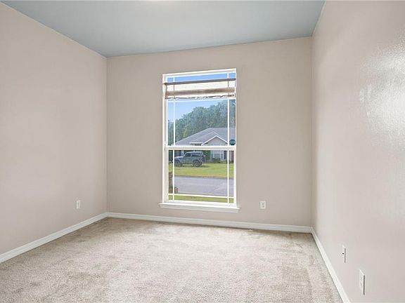 5th image of 8233 Woodland Hills Dr N