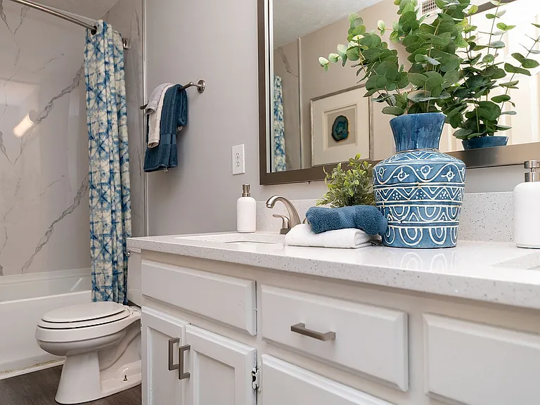 Bright bathroom with quartz counters
