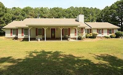Beautiful home on tree lined acre lot
