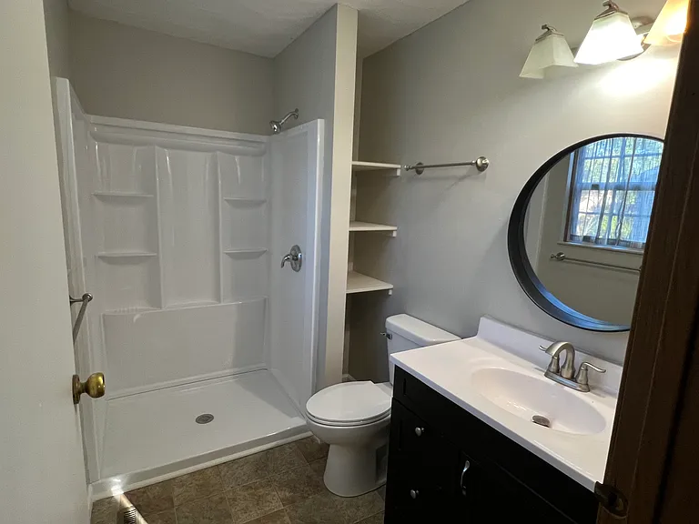 Master bathroom with new shower and toilet.