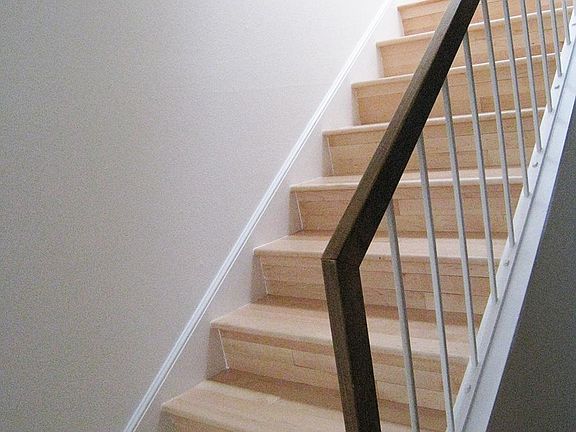 Stairs down to kitchen/formal dining room