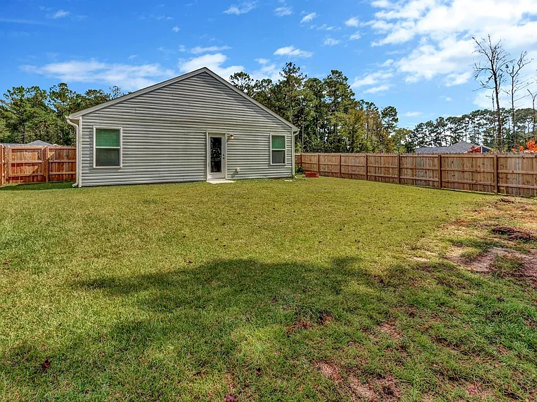 Completely Fenced-In Backyard. Great for doggies or kiddos!
