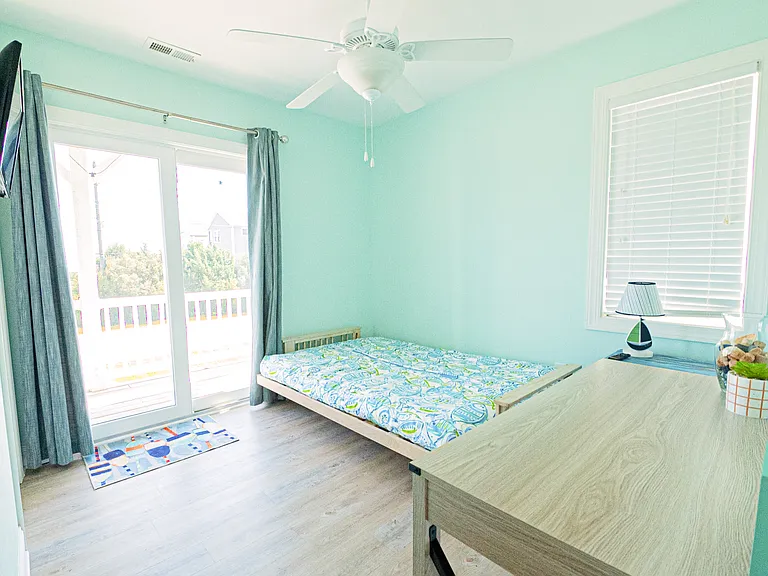 futon/office room with TV