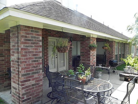 Large covered patio off of the family room.