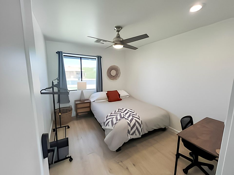 Queen bed, nightstand, desk and chair plus rolling rack.