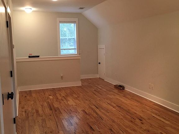 Den (private stair entry in background)