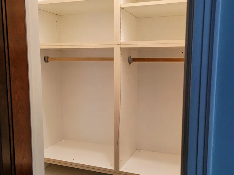 Master bedroom close with shelves