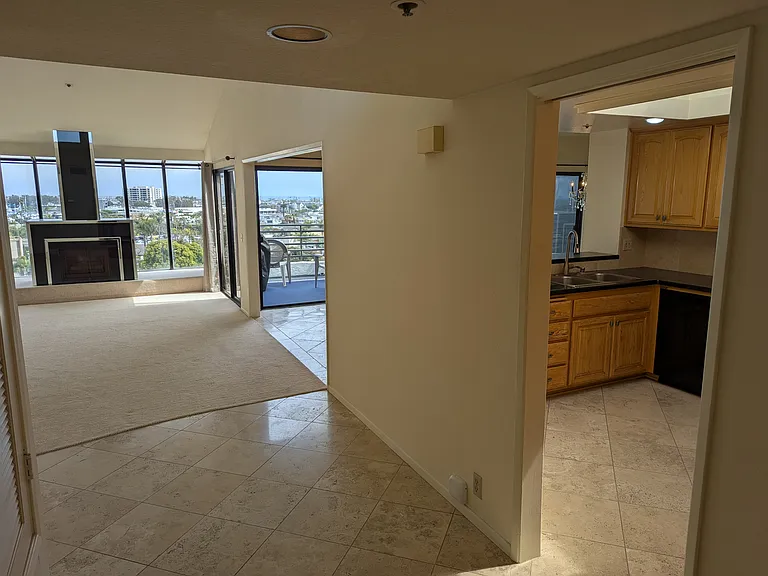Entryway into kitchen and living room