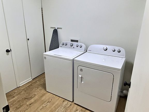 Laundry room with washer and dryer included