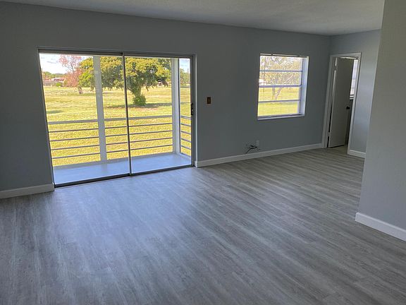 Living Room, Den & Guest Bathroom.