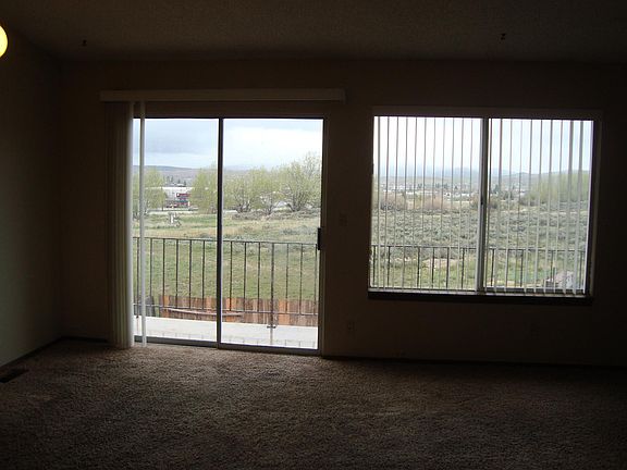 Great room sliding glass door exit to the balcony