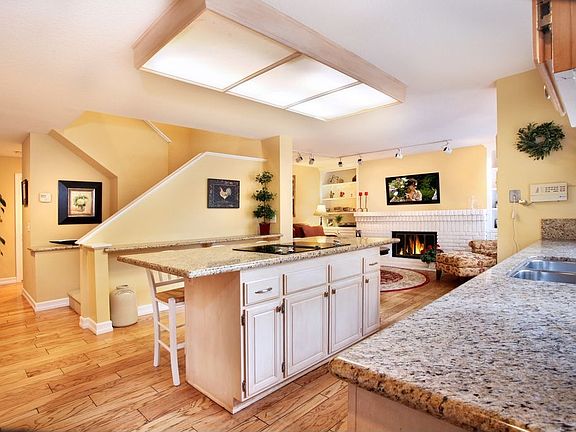 The kitchen leads into the Family Room