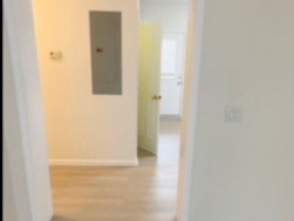LIVING ROOM AND HALLWAY