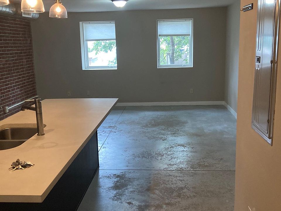Large updated kitchen -- new LVP 'wood' floors installed (not pictured). Open concept living room next to kitchen