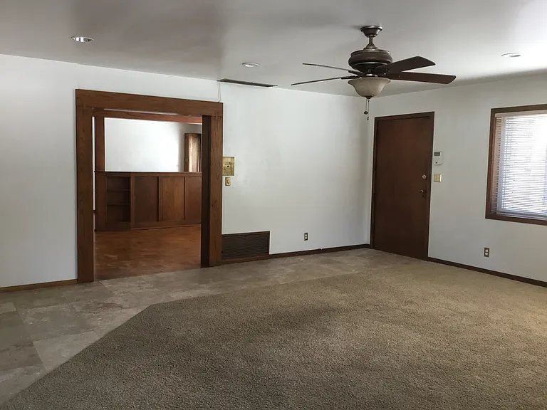 Carpet has been replaced with wood