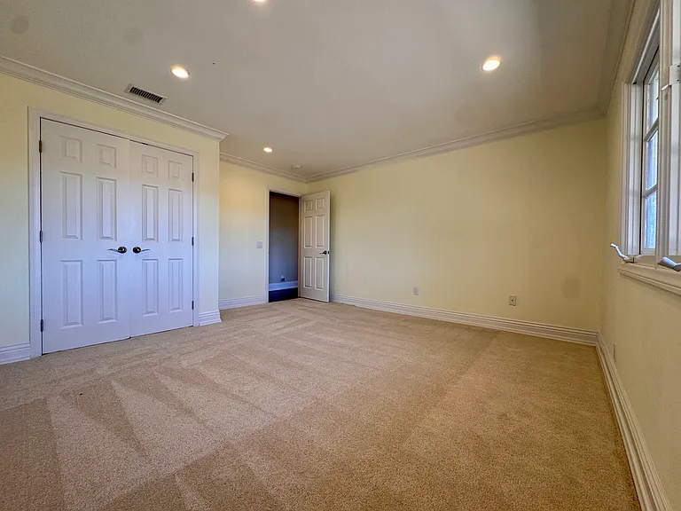 Bedroom with carpet
