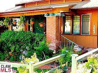 A typical Craftsman, this has the brick columns & porch