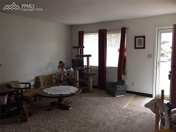 Dining opens to kitchen with walkout to fenced, back yard.