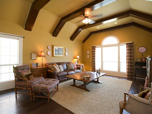 Amazing wood beams in large living rm
