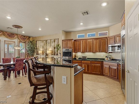 5th image of 9518 Quiet Valley Ave