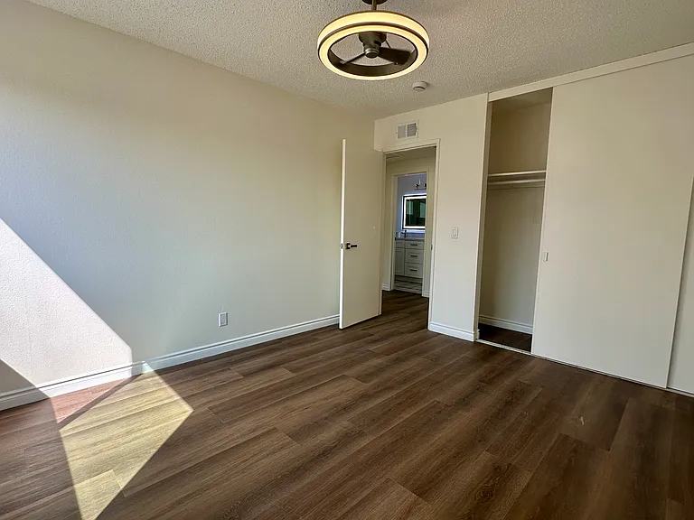 Bedroom 4, new flooring, modern ceiling fan