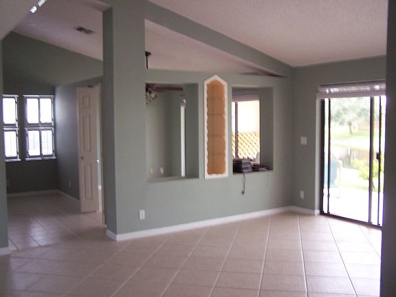 Large family room w/built in lighted display