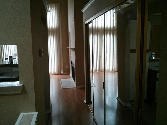 Hallway at top of stairs bedroom on right living room to lef