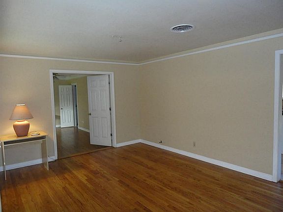 When you first walk in, if you turn to your left you're in the den.