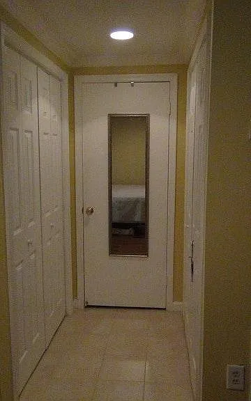 Hall to bathroom, clothes closet and laundry
