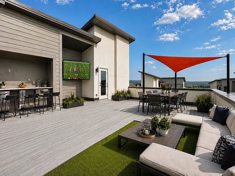 Expansive private rooftop deck with composite wood flooring,with a large wet bar & dedicated turf area, all set against breathtaking Lake Travis Hill Country view. Perfect for entertaining, sunbathing, or stargazing under the Texas sky. Life is Good here!