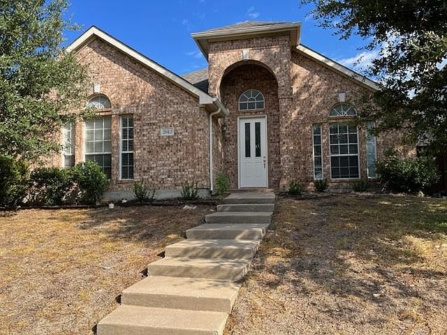 North/south facing home situated on a quiet street in west Allen