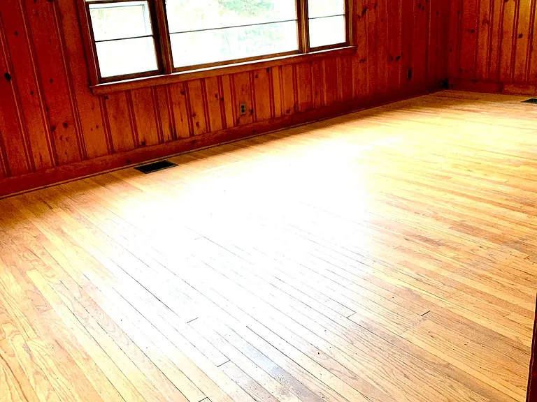 Large hardwood floor living room