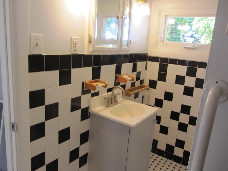 New vanity and faucet in bathroom.