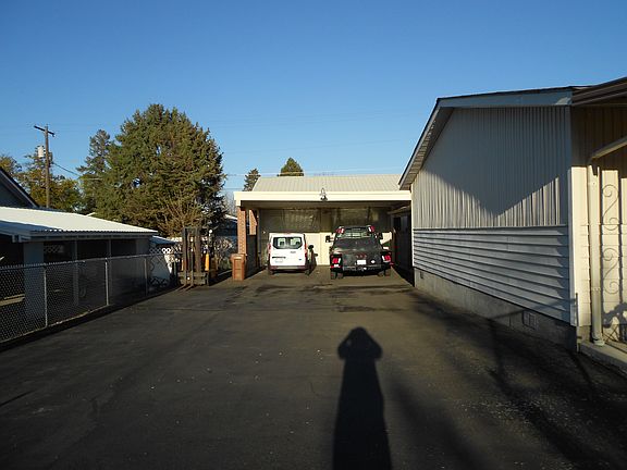 Asphalt drive, carport