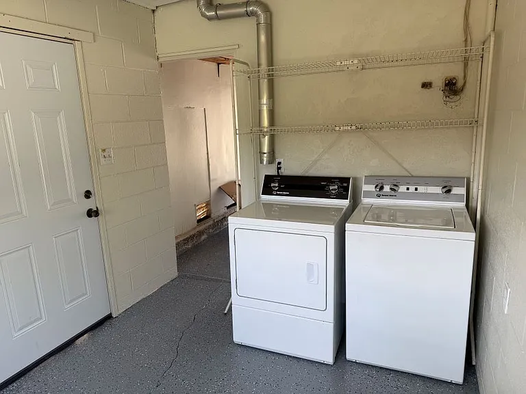 Laundry room with washer and dryer.