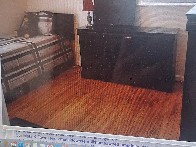 This is a partial vew of a large bedroom with hardwood floors.
Hardwood floors are throughout the entire house.
