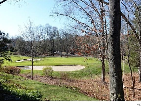 Golf course view from Living room and Dining room.