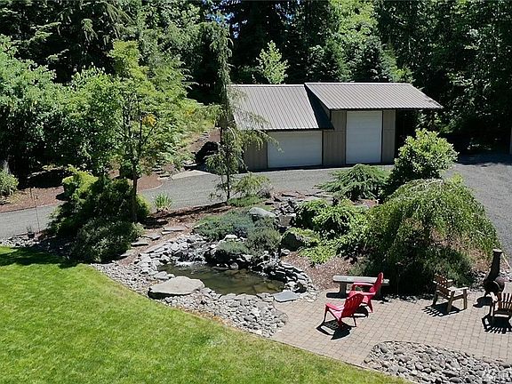 Large shop and water feature with sitting area