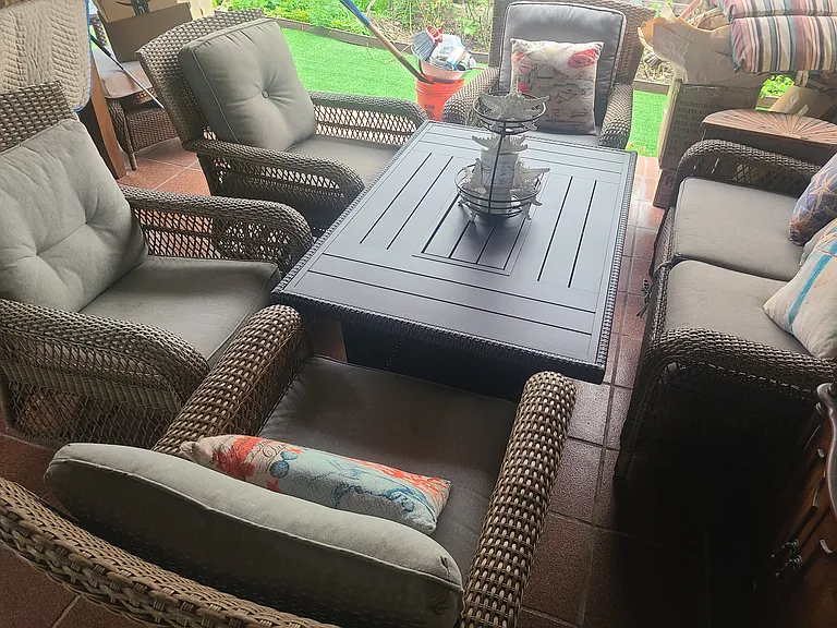 Covered patio fire pit seating for 6 People.