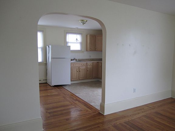 Living room view into kitchen