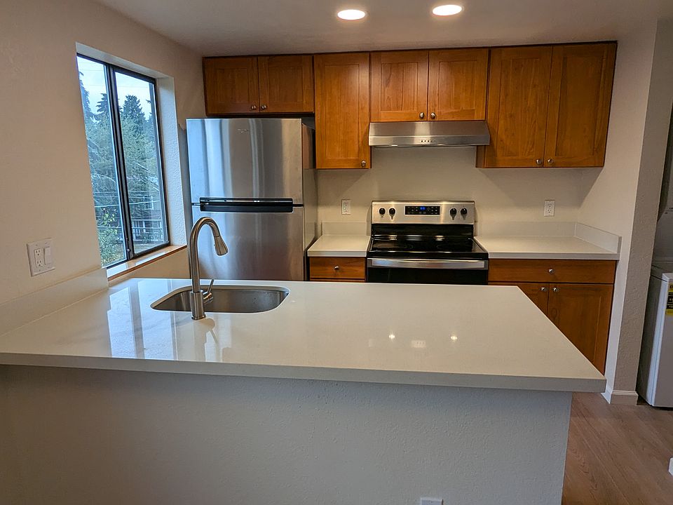 Full kitchen renovation in 2024 with new cabinets, appliances, and quartz countertops.