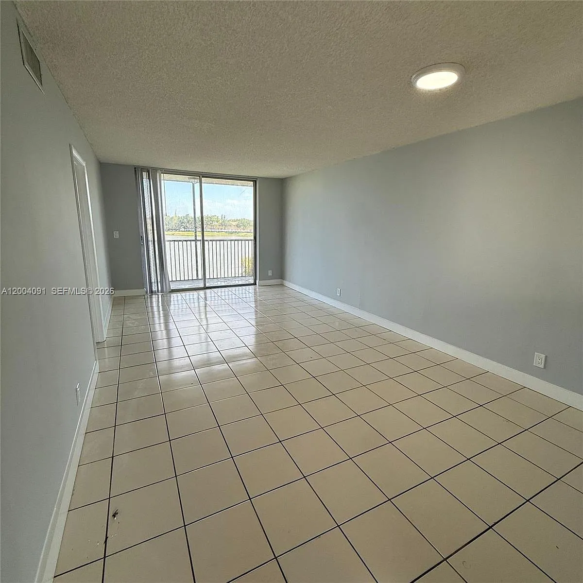 Building Photo - 8710 N Sherman Cir #305