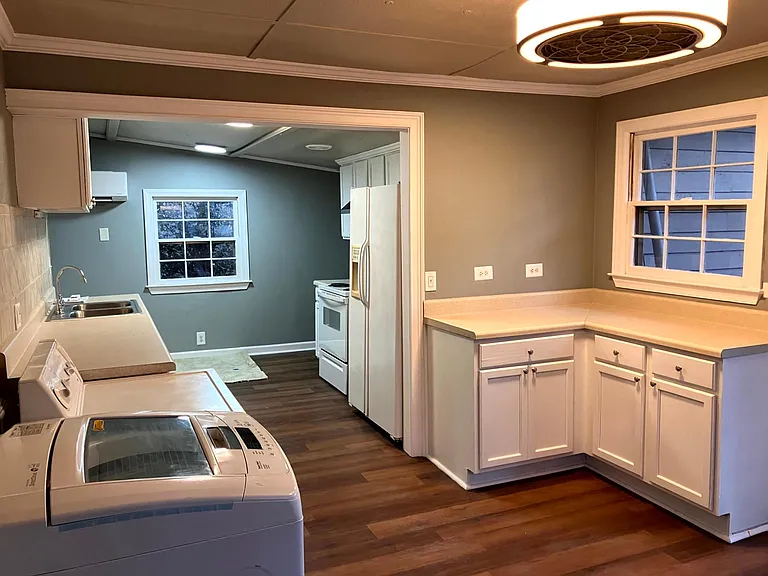 Kitchen View lot of windows in whole house.